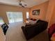 Spacious living room with ample natural light and comfortable seating at 8425 Crystal Cove Loop, Kissimmee, FL 34747