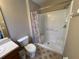 Bathroom featuring a shower stall and updated vanity at 8425 Crystal Cove Loop, Kissimmee, FL 34747