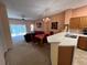Dining area with table and chairs, view of living room at 8425 Crystal Cove Loop, Kissimmee, FL 34747