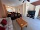Open living area with kitchen, dining, and stairs visible at 8425 Crystal Cove Loop, Kissimmee, FL 34747