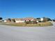 House exterior view showing a single story home on a corner lot with landscaping at 4773 Nw 32Nd St, Ocala, FL 34482
