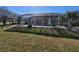 Side view of house with pool and screened enclosure at 4773 Nw 32Nd St, Ocala, FL 34482