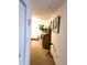 A hallway with carpeted floors and access to other rooms at 4773 Nw 32Nd St, Ocala, FL 34482