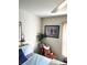 Bedroom with a bed, chair, and window at 4773 Nw 32Nd St, Ocala, FL 34482