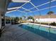 Refreshing screened-in pool ideal for outdoor relaxation at 4773 Nw 32Nd St, Ocala, FL 34482