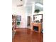 Spacious dining area with hardwood floors and a view of the kitchen at 4773 Nw 32Nd St, Ocala, FL 34482