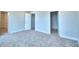Spacious bedroom with plush carpeting and ample closet space at 1492 Leamington Ln, Winter Haven, FL 33884