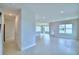 Open living space with tile floors and plenty of natural light at 1492 Leamington Ln, Winter Haven, FL 33884