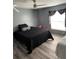 Bedroom with a queen bed, twin bed, and ceiling fan at 50989 Highway 27 # 230, Davenport, FL 33897