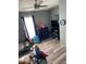 bedroom with twin beds and plenty of toys at 50989 Highway 27 # 230, Davenport, FL 33897