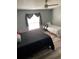 Spacious bedroom with a large bed and ceiling fan at 50989 Highway 27 # 230, Davenport, FL 33897