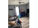 Two twin beds, toys, and a dog in a well-lit bedroom at 50989 Highway 27 # 230, Davenport, FL 33897