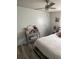 Bedroom with vanity and wood-look flooring at 50989 Highway 27 # 230, Davenport, FL 33897
