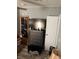 Bedroom with wood-look flooring and dresser at 50989 Highway 27 # 230, Davenport, FL 33897