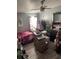 Bedroom with wood-look flooring, and lots of storage at 50989 Highway 27 # 230, Davenport, FL 33897