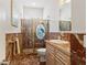 Bathroom with marble floors and walk-in shower at 352 Meandering Way, Polk City, FL 33868