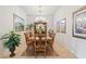 Formal dining room with wood table and chairs at 352 Meandering Way, Polk City, FL 33868