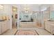 Luxurious Primary bathroom with a soaking tub and walk-in shower at 352 Meandering Way, Polk City, FL 33868