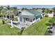 Single story house with a covered patio and outdoor kitchen at 336 Motorcoach S Dr, Polk City, FL 33868