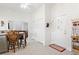 Bright entryway with coat hooks and access to kitchen and laundry at 336 Motorcoach S Dr, Polk City, FL 33868