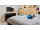Main bedroom with king bed, large closet, and dresser at 336 Motorcoach S Dr, Polk City, FL 33868