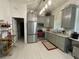 Modern kitchen with stainless steel appliances and granite countertops at 336 Motorcoach S Dr, Polk City, FL 33868