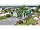 This home has a large garage, covered parking, and lovely landscaping at 336 Motorcoach S Dr, Polk City, FL 33868