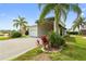 Exterior view of the home, showcasing the garage and landscaping at 336 Motorcoach S Dr, Polk City, FL 33868
