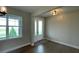 Bright and airy entryway with hardwood floors and natural light at 532 Adams View Ln, Auburndale, FL 33823