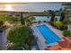 Lap pool and lounge area for resort-style living at 532 Adams View Ln, Auburndale, FL 33823