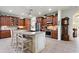 Spacious kitchen with an island, stainless steel appliances, and ample cabinetry at 360 Motorcoach S Dr, Polk City, FL 33868