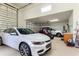 Garage with golf cart and additional vehicle parking at 360 Motorcoach S Dr, Polk City, FL 33868