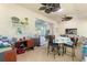 Bright sunroom with table and chairs, perfect for relaxing at 360 Motorcoach S Dr, Polk City, FL 33868