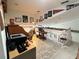 Upstairs loft office with built-in desk and plenty of natural light at 1214 Motorcoach Dr, Polk City, FL 33868