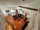 Open living room with hardwood floors, sectional sofa, and high ceilings at 1214 Motorcoach Dr, Polk City, FL 33868
