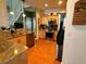 Open concept kitchen with granite countertops and stainless steel appliances at 1214 Motorcoach Dr, Polk City, FL 33868