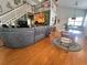 Two-story living room with hardwood floors and loft area at 1214 Motorcoach Dr, Polk City, FL 33868