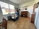 Bright home office with recliner and large window at 1214 Motorcoach Dr, Polk City, FL 33868
