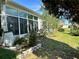 Bright sunroom with large windows at 1214 Motorcoach Dr, Polk City, FL 33868