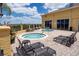 Community hot tubs with lounge chairs, perfect for relaxation and recreation at 6265 Pinehurst Loop, Winter Haven, FL 33884