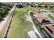 Aerial view of a luxury home community with golf course and solar panels at 6265 Pinehurst Loop, Winter Haven, FL 33884