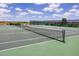 Well-maintained tennis courts, ideal for recreational sports at 6265 Pinehurst Loop, Winter Haven, FL 33884
