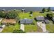 Lakefront home with a large yard and driveway at 274 Paradise Island Dr, Haines City, FL 33844