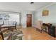 Inviting entryway with hardwood floors and a charming sitting area at 274 Paradise Island Dr, Haines City, FL 33844