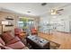 Open concept kitchen and living area with lake view and white cabinets at 274 Paradise Island Dr, Haines City, FL 33844
