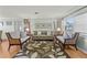 Relaxing living room with hardwood floors and neutral-toned furniture at 274 Paradise Island Dr, Haines City, FL 33844