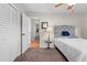 Guest bedroom with a queen-size bed and built-in closet at 274 Paradise Island Dr, Haines City, FL 33844