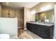 Modern bathroom with double vanity, granite countertop, and large shower at 3671 E Gaskins Rd, Bartow, FL 33830