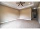 Bright bedroom with ceiling fan and neutral carpeting at 3671 E Gaskins Rd, Bartow, FL 33830