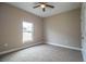 Bright bedroom with ceiling fan and window at 3671 E Gaskins Rd, Bartow, FL 33830